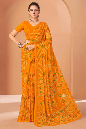 Mustard Bandhani Printed Chiffon Saree Accented With Intricate Lace Border Work