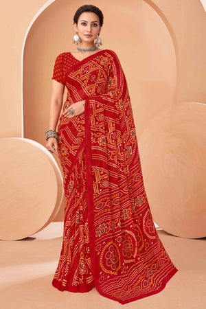 Red Bandhani Printed Chiffon Saree Accented With Intricate Lace Border Work