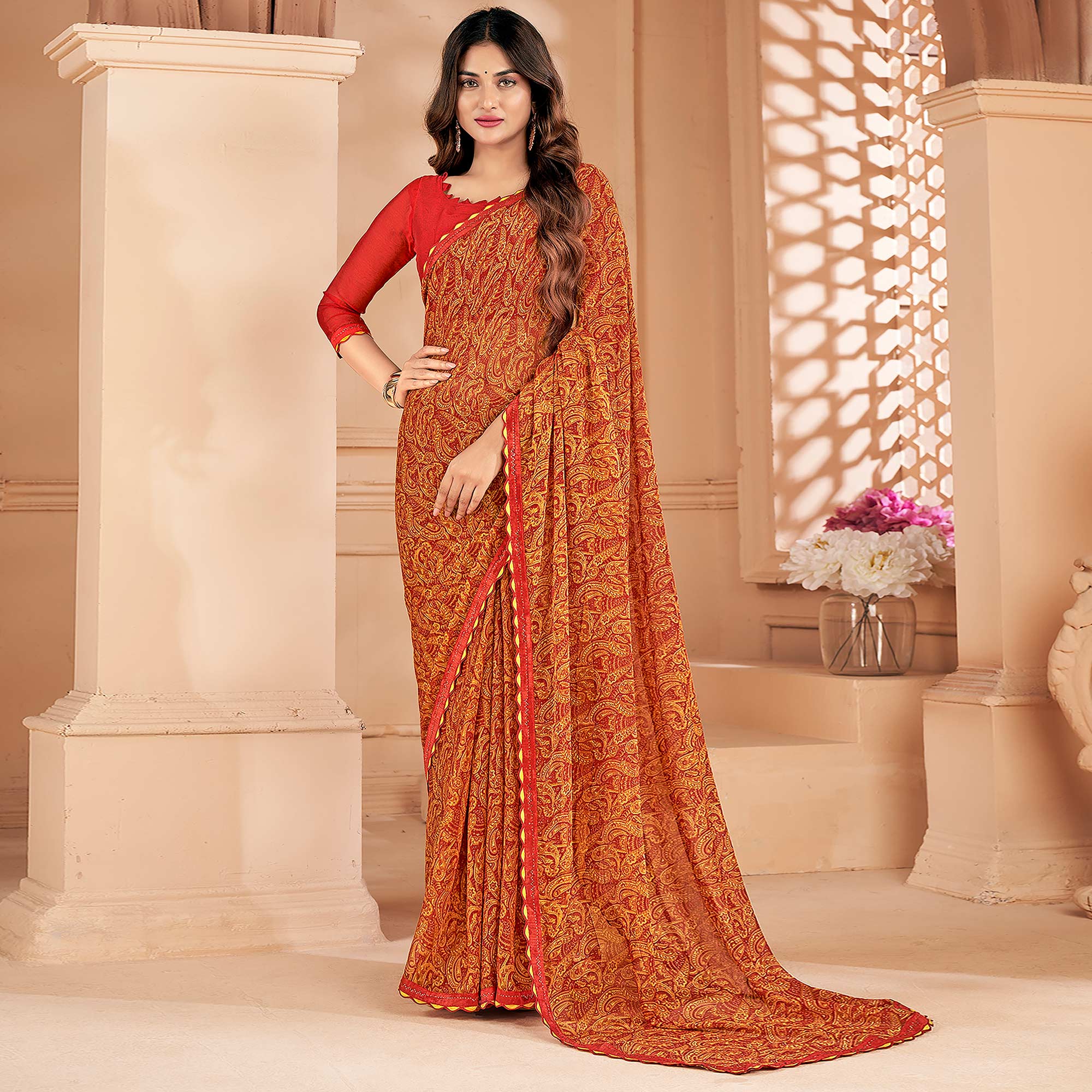 Orange Printed Chiffon Saree With Lace Border