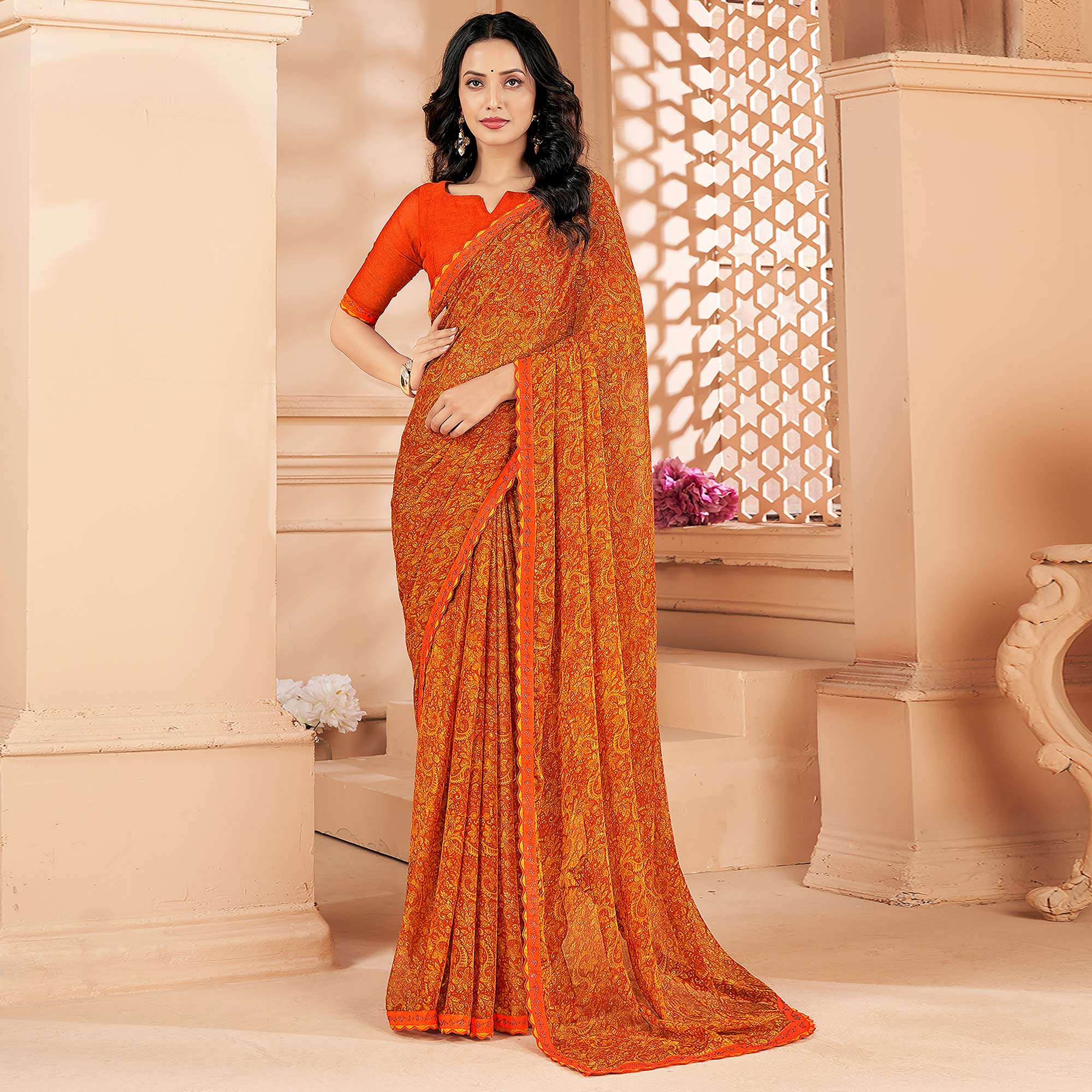 Orange Printed Chiffon Saree With Lace Border