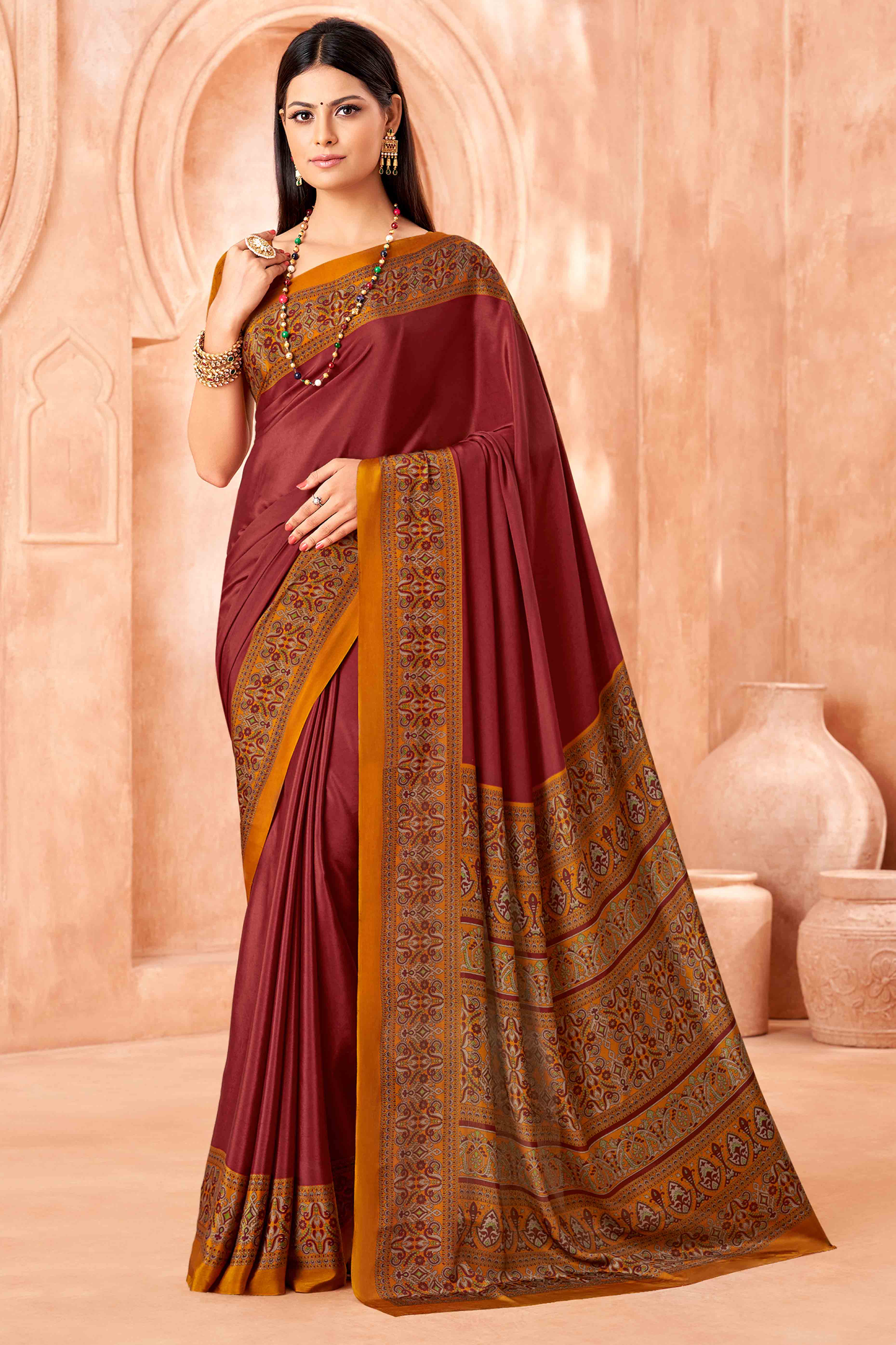 Maroon Crepe Silk Saree with Elegant Floral Print Detailing