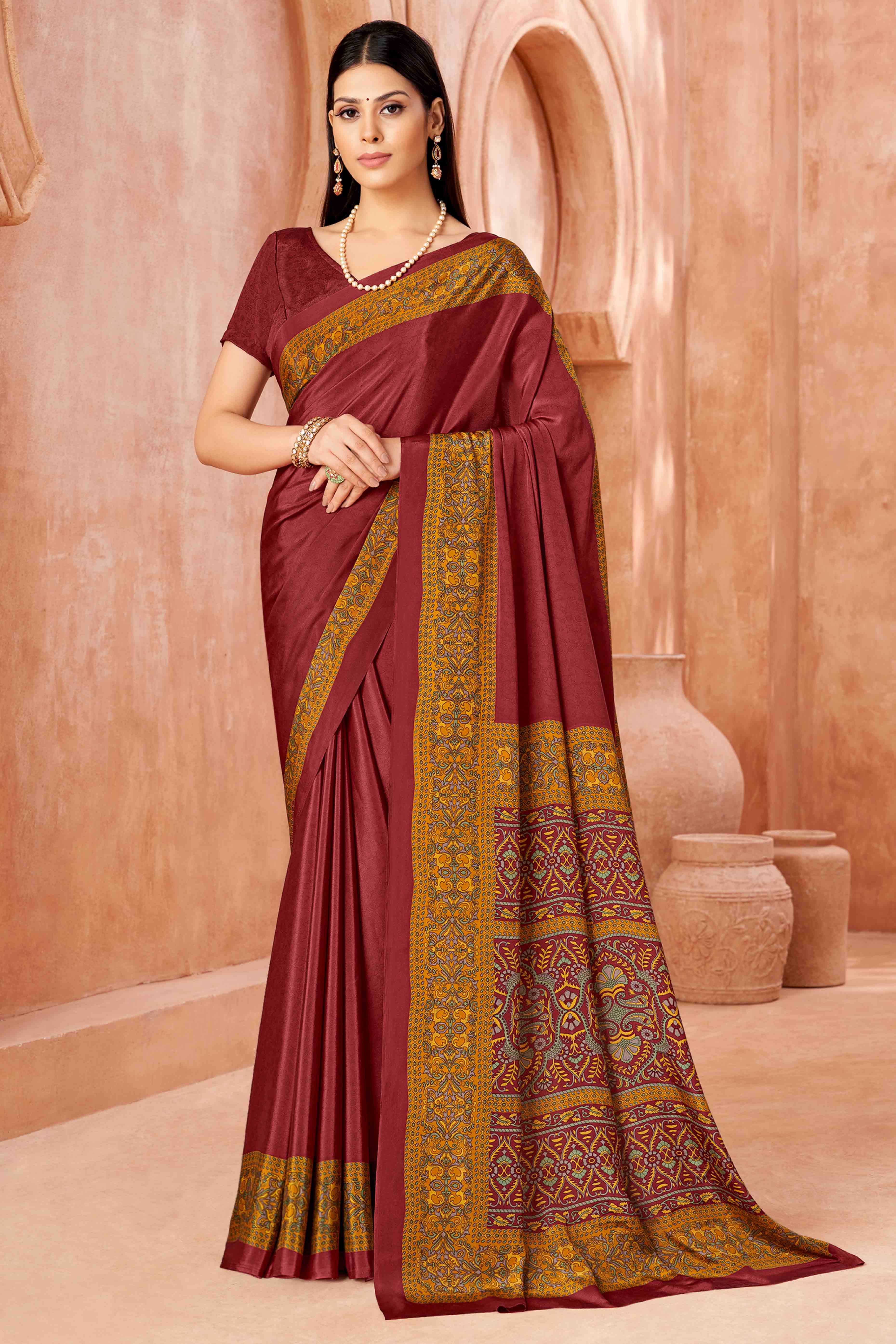 Maroon Crepe Silk Saree with Elegant Floral Print Detailing