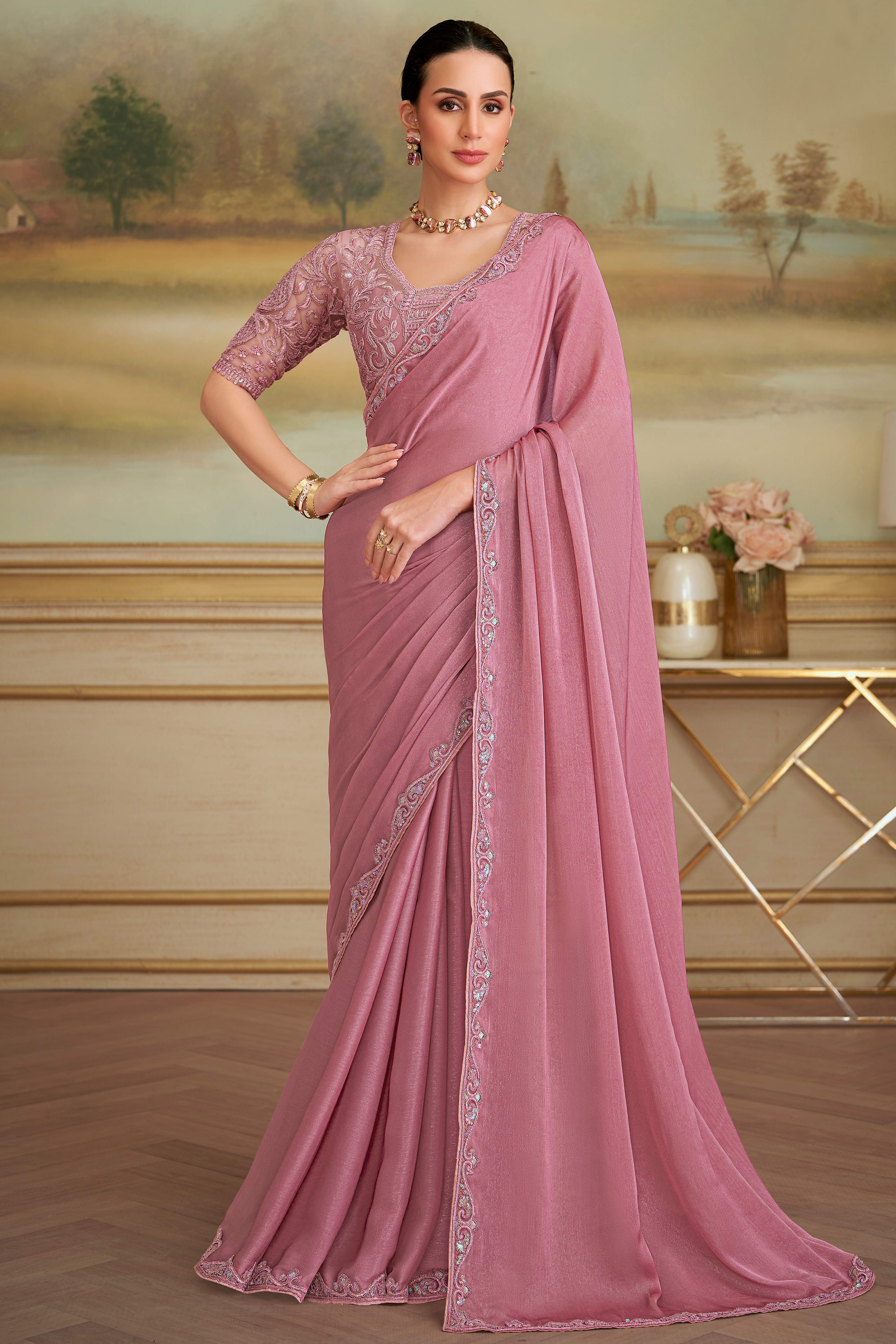 Graceful Onion Pink Sparkle Georgette Saree Adorned With Floral Sequins Embroidered Lace Border