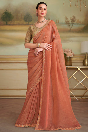 Sophisticated Rust Orange Gold Georgette Saree Accented With Floral Sequins Embroidered Lace Border