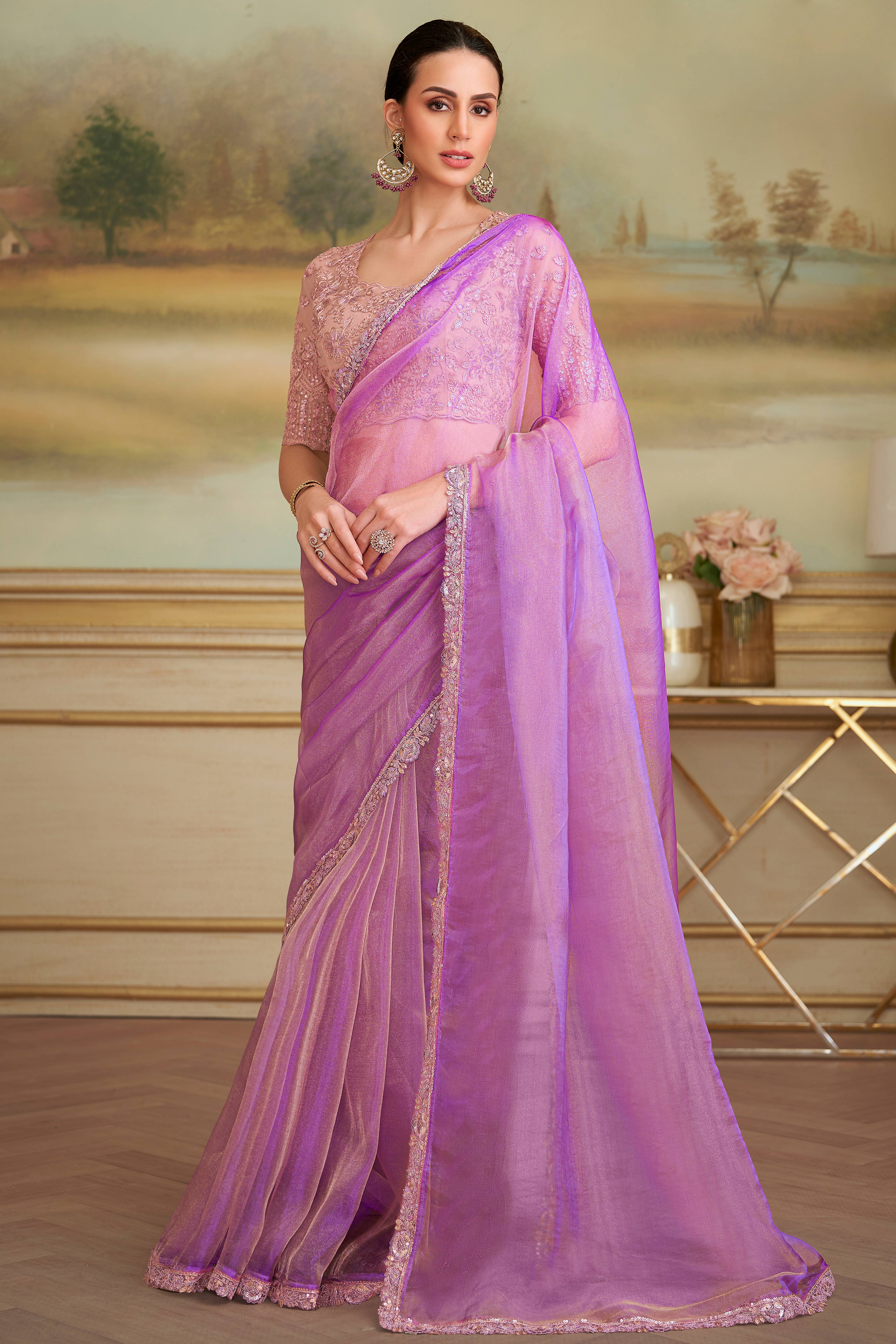Lustrous Light Magenta Solid Tissue Silk Saree Showcasing Sequins Embroidered & Stylish Lace Border