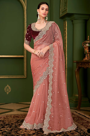 Charming Peach Georgette Saree Adorned With Floral Cording Sequins Embroidery & Cutwork Border