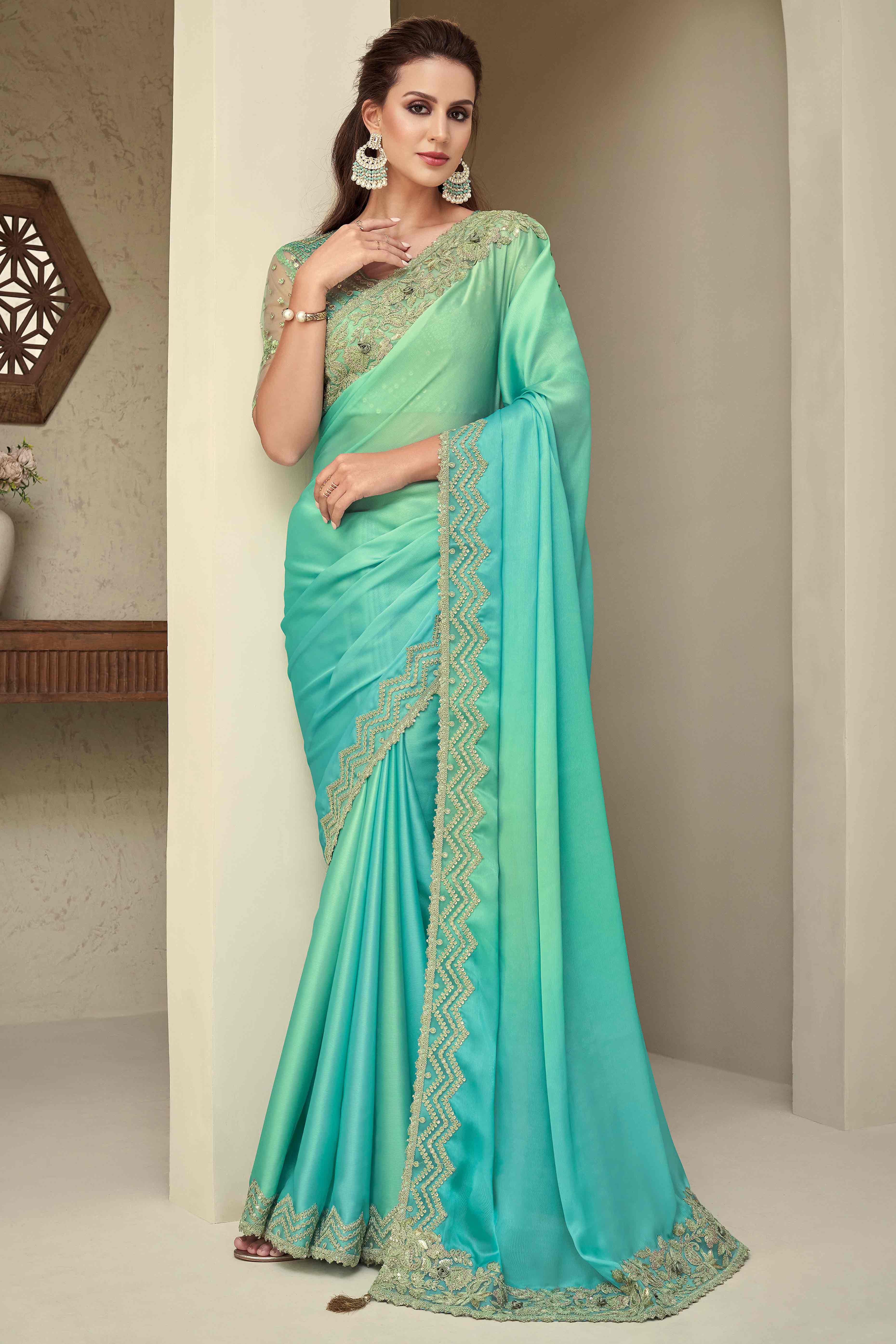 Turquoise Floral Sequins Embroidered Georgette Saree