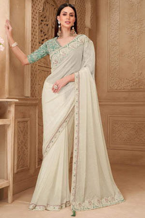 Shimmering Cream Georgette Saree with Graceful Thread Embellishment and Sequins