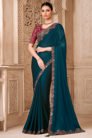 Shimmering Teal Georgette Saree with Graceful Thread Embellishment and Sequins
