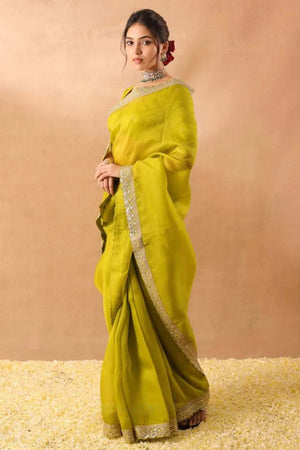 Lime Green Soft Tissue Saree Adorned with Alluring Sequin Detailing for a Luxurious Look