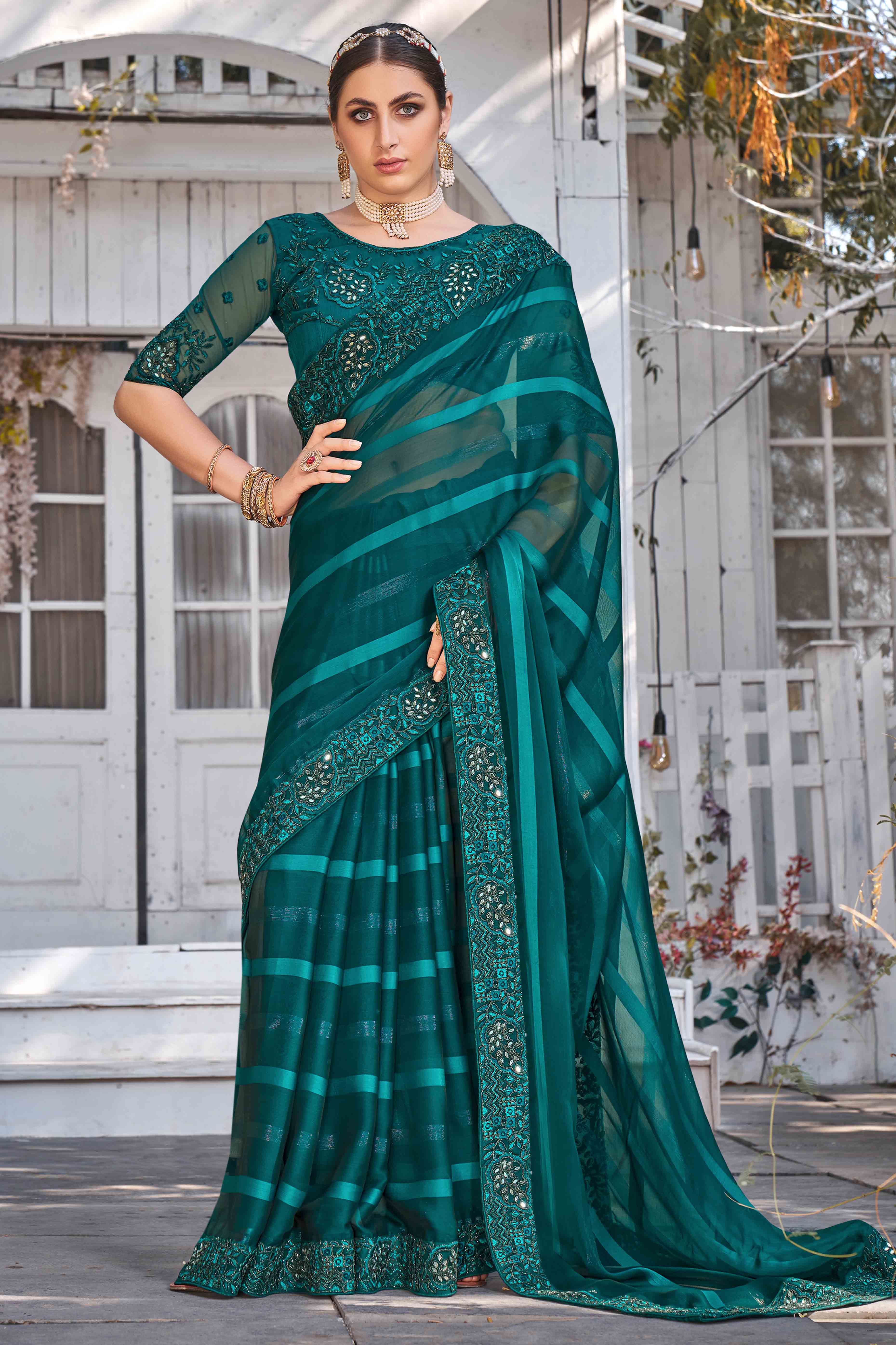 Teal Sequins With Floral Embroidered Georgette Saree