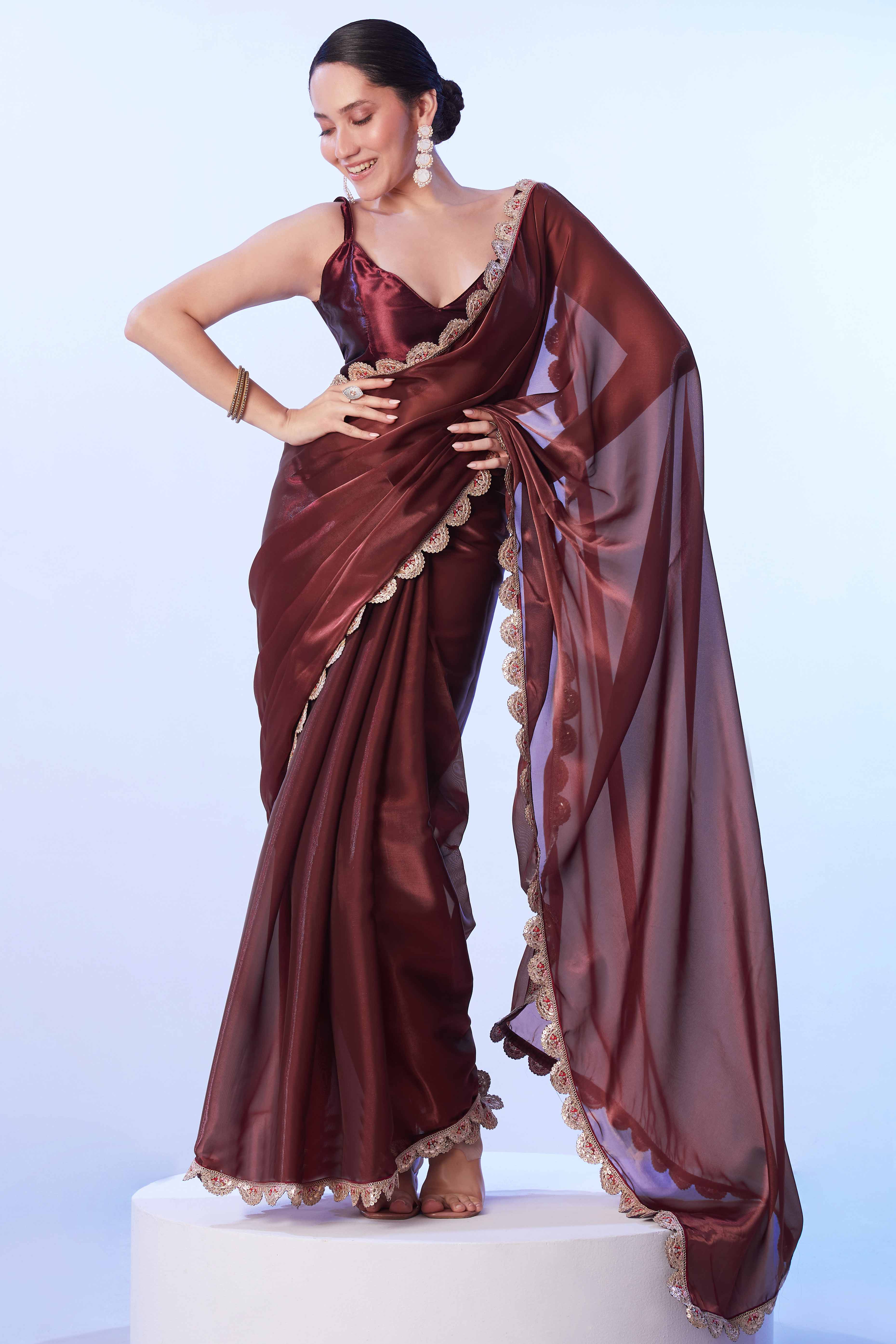 Brown Satin Solid Saree Adorned with Sequins Work