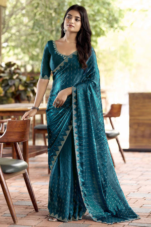 Graceful Teal Nylon Partywear Saree Adorned with Exquisite Stone Work