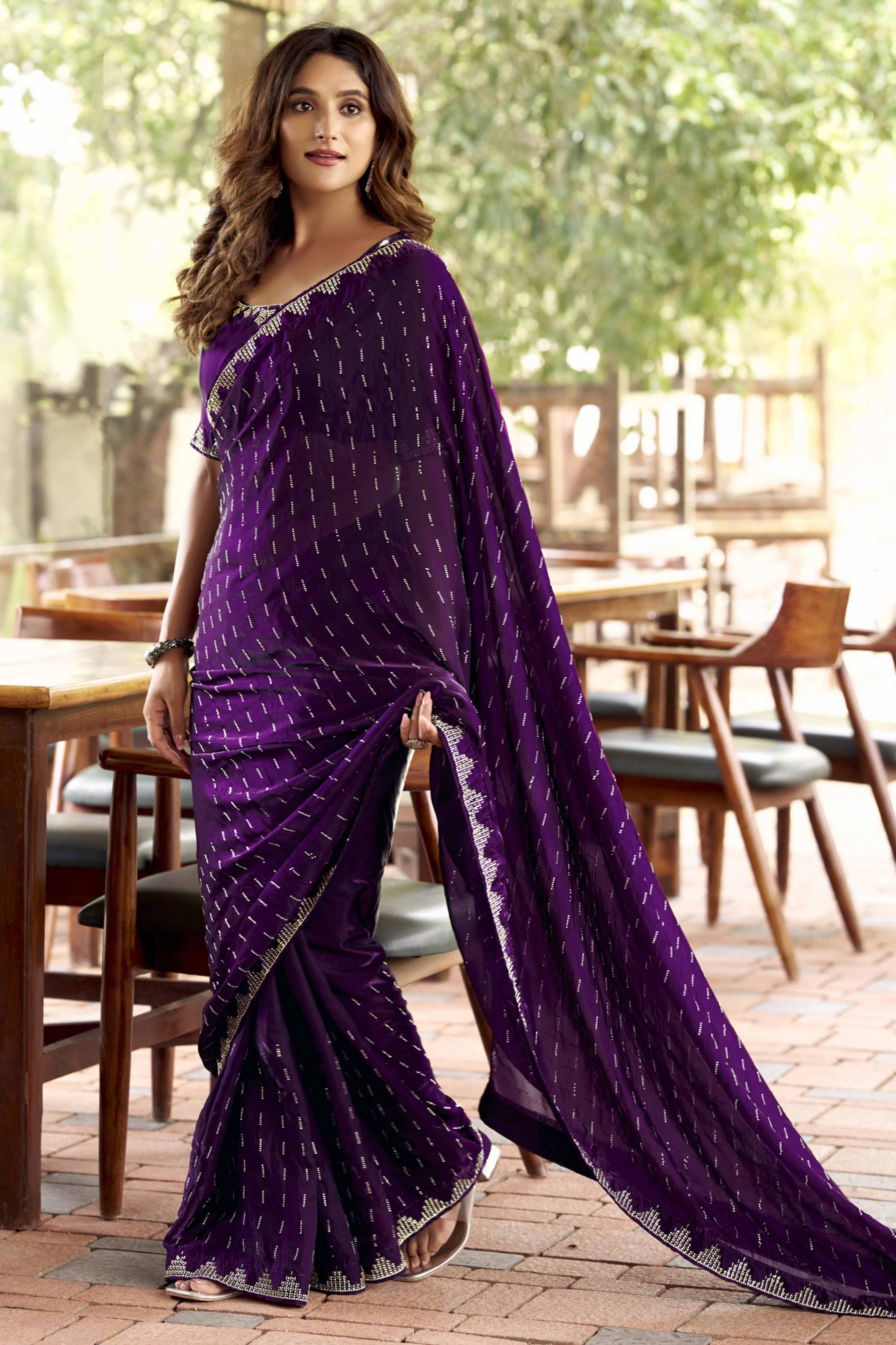 Graceful Purple Nylon Partywear Saree Adorned with Exquisite Stone Work