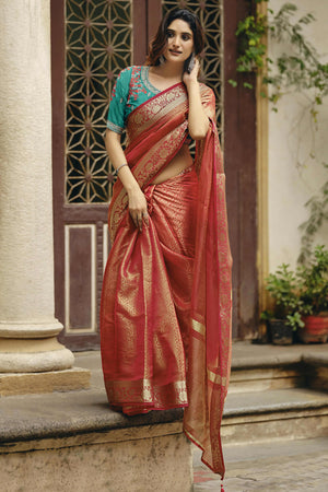 Elegant Orange Partywear Nylon Silk Saree with Stone & Weaving Details