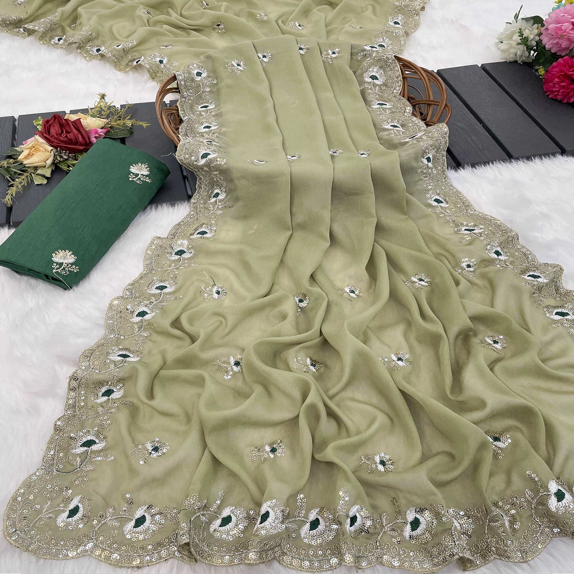 Green Georgette Silk Saree With Floral Sequin Embroidery & Graceful Cutwork Detailing Border