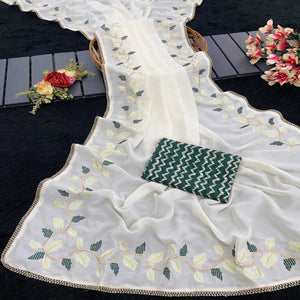 Elegant Offwhite & Green Pure Silk Saree With Intricate Thread Embroidery And Delicate Lace Border