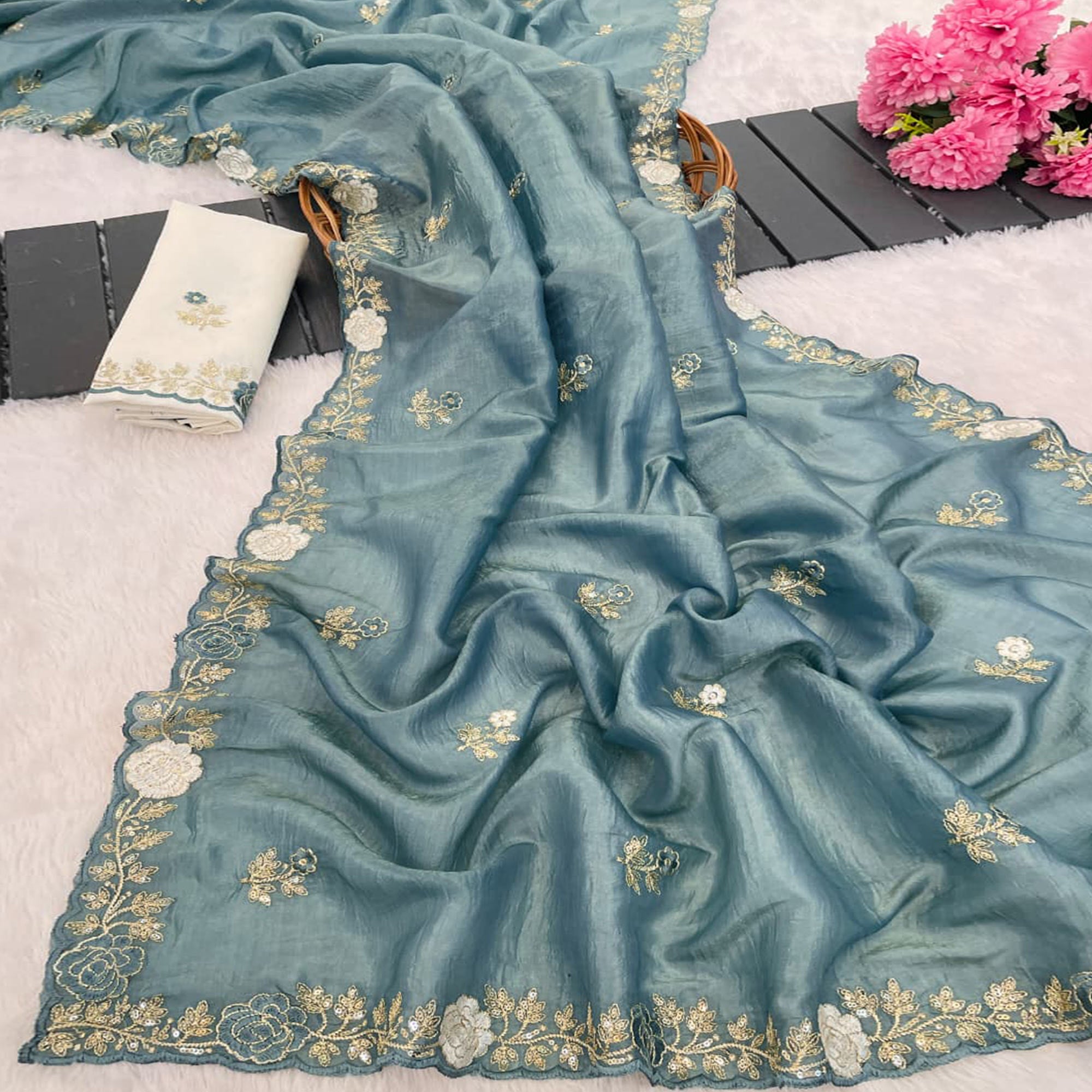 Blue Lightweight Georgette Crush Saree Adorned with Delicate Floral Embroidery