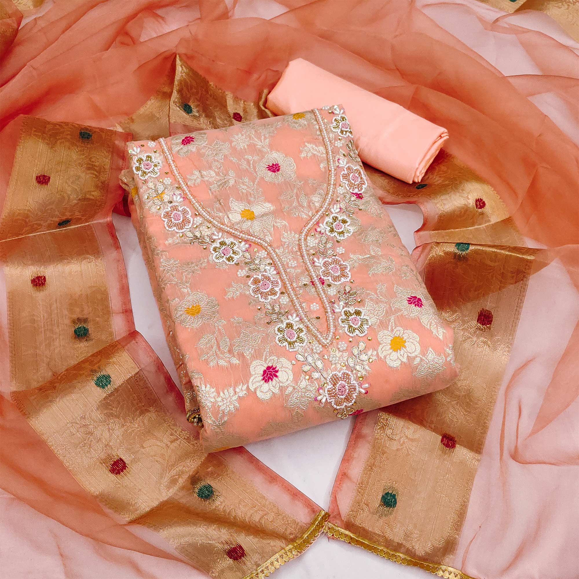 Peach Floral Woven With Hand Embroidery Muslin Dress Material