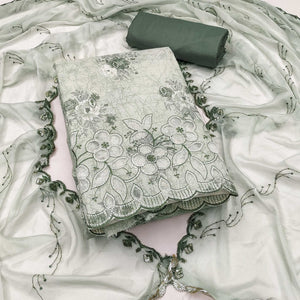 Green Floral Cambric Cotton Dress Material With Elegant Embroidery Work