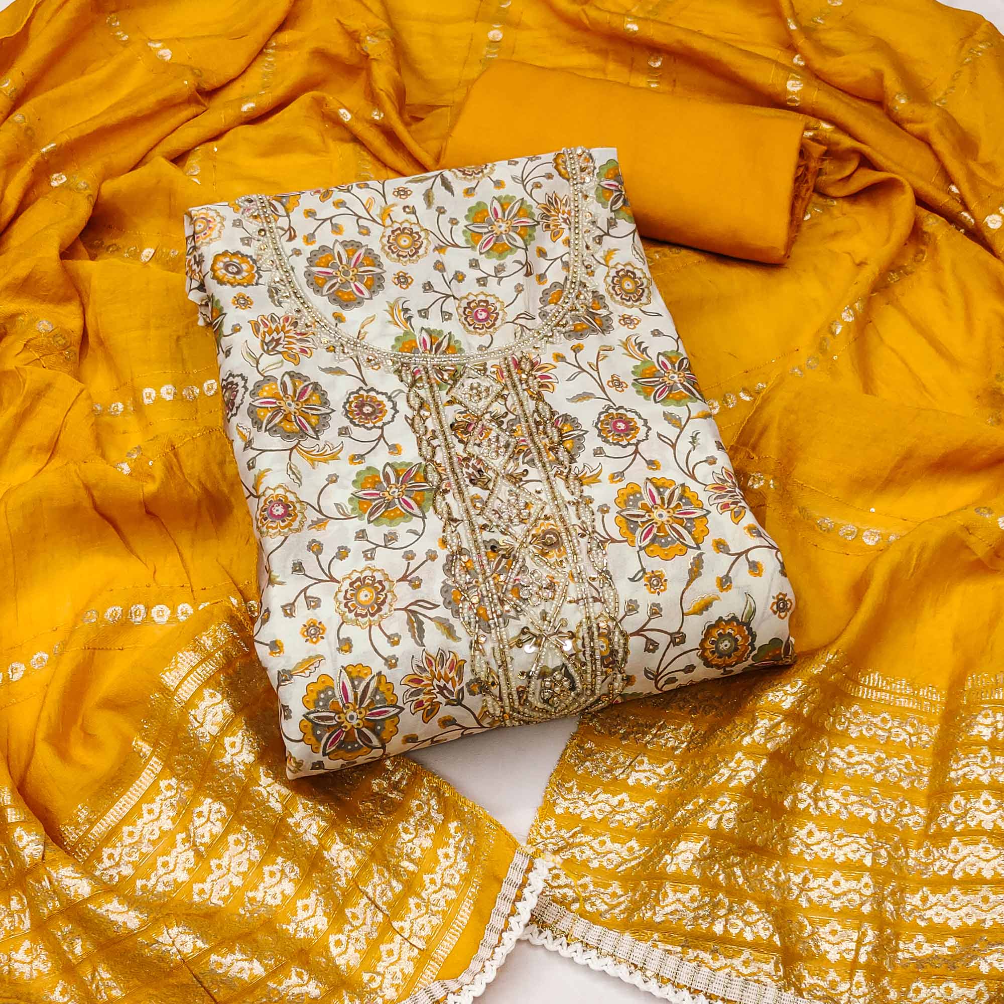 Mustard Floral Printed Roman Cotton Silk Dress Material With Intricate Moti & Sequins Handwork