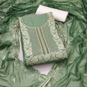 Green Cotton Silk Dress Material Embellished With Floral Embroidery & Intricate Handwork