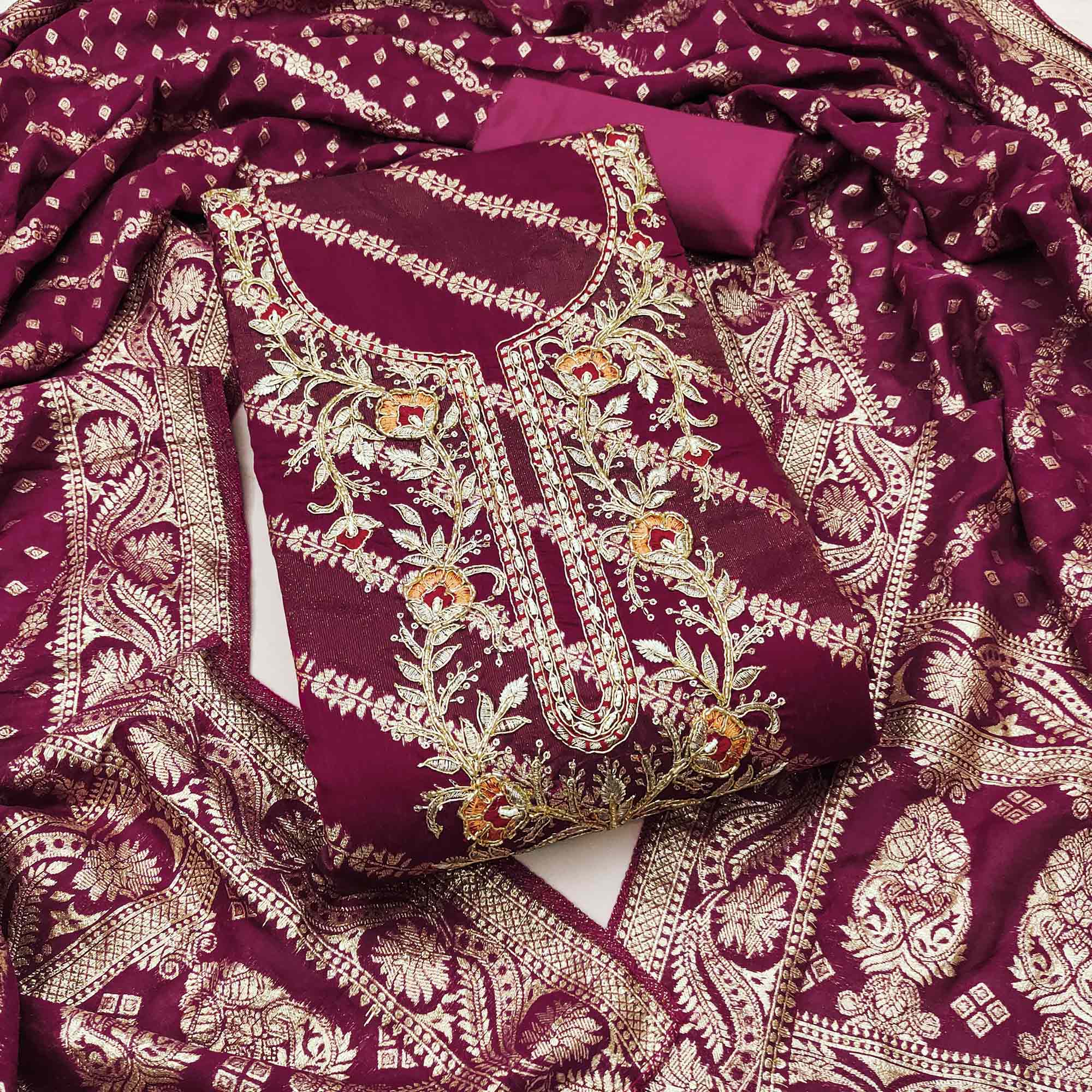 Magenta Shimmer Cotton Silk Suit Material Featuring Zari Weaving and Artistic Embroidered Detailing