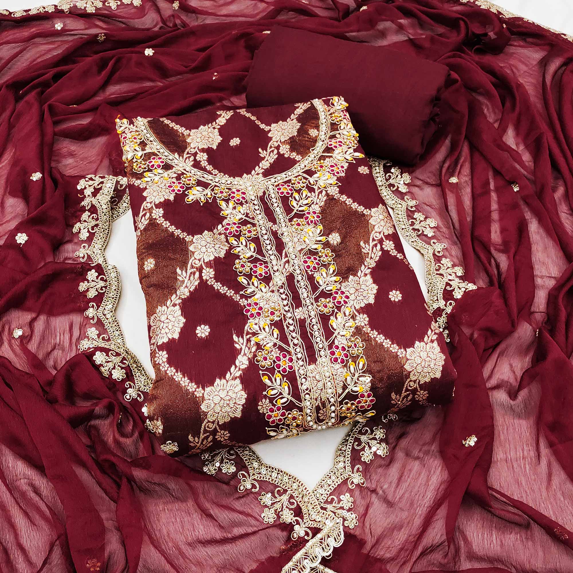 Opulent Maroon Floral Woven Banarasi Silk Dress Material With Detailed Handwork & Sequin Embroidery