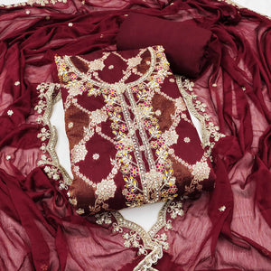 Opulent Maroon Floral Woven Banarasi Silk Dress Material With Detailed Handwork & Sequin Embroidery