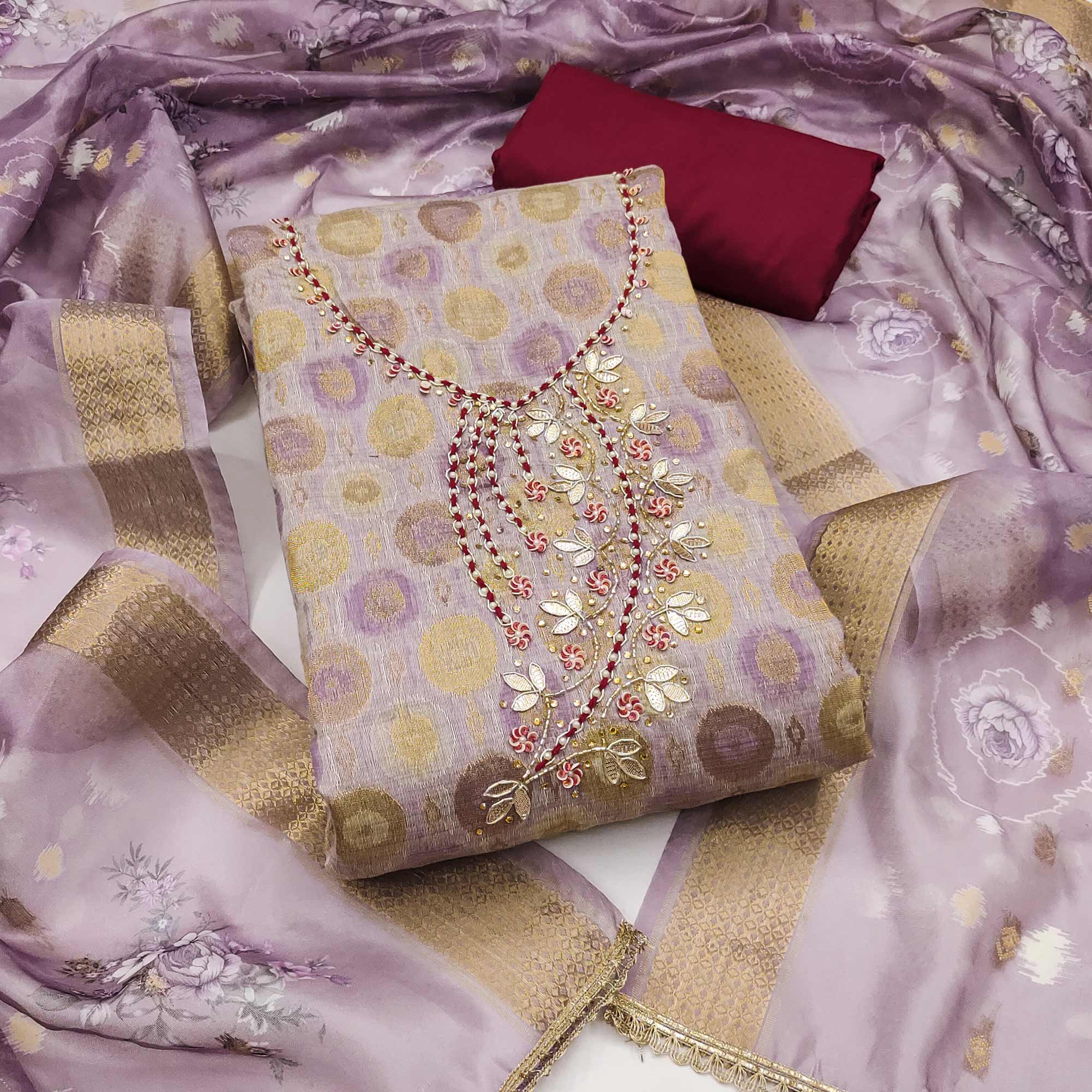 Sophisticated lavender Zari Woven Jacquard Dress Material Highlighted With Floral Handwork