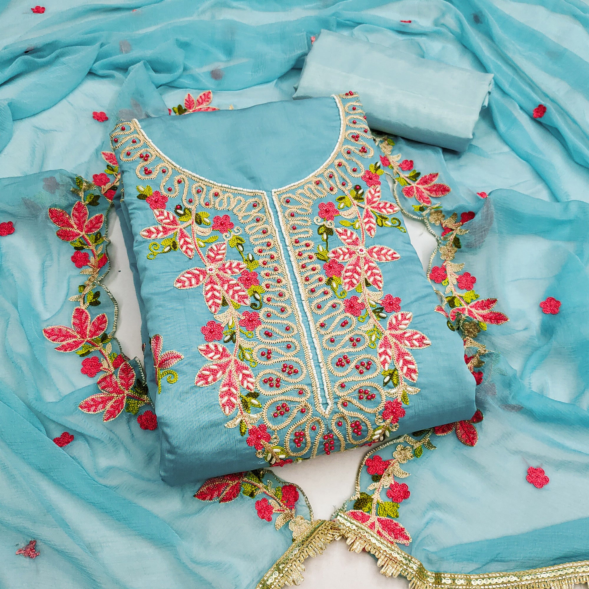 Charming Blue Floral Embroidery Cotton Silk Dress Material Enhanced With Elegant Moti Handwork