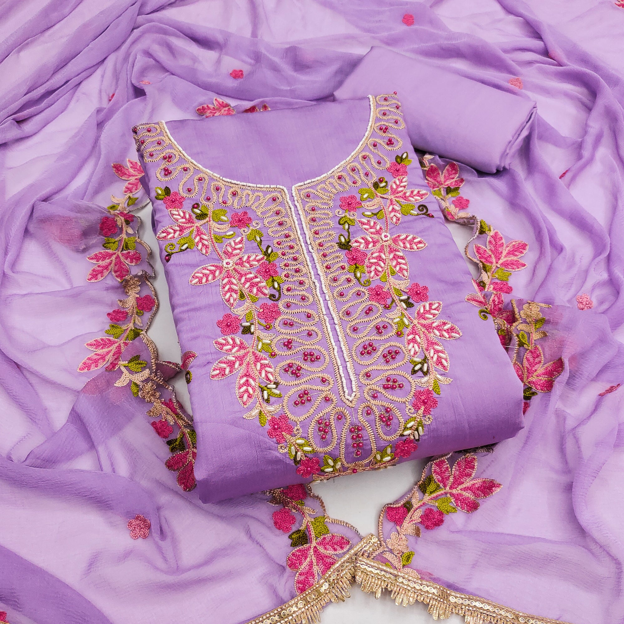 Charming Lavender Floral Embroidery Cotton Silk Dress Material Enhanced With Elegant Moti Handwork