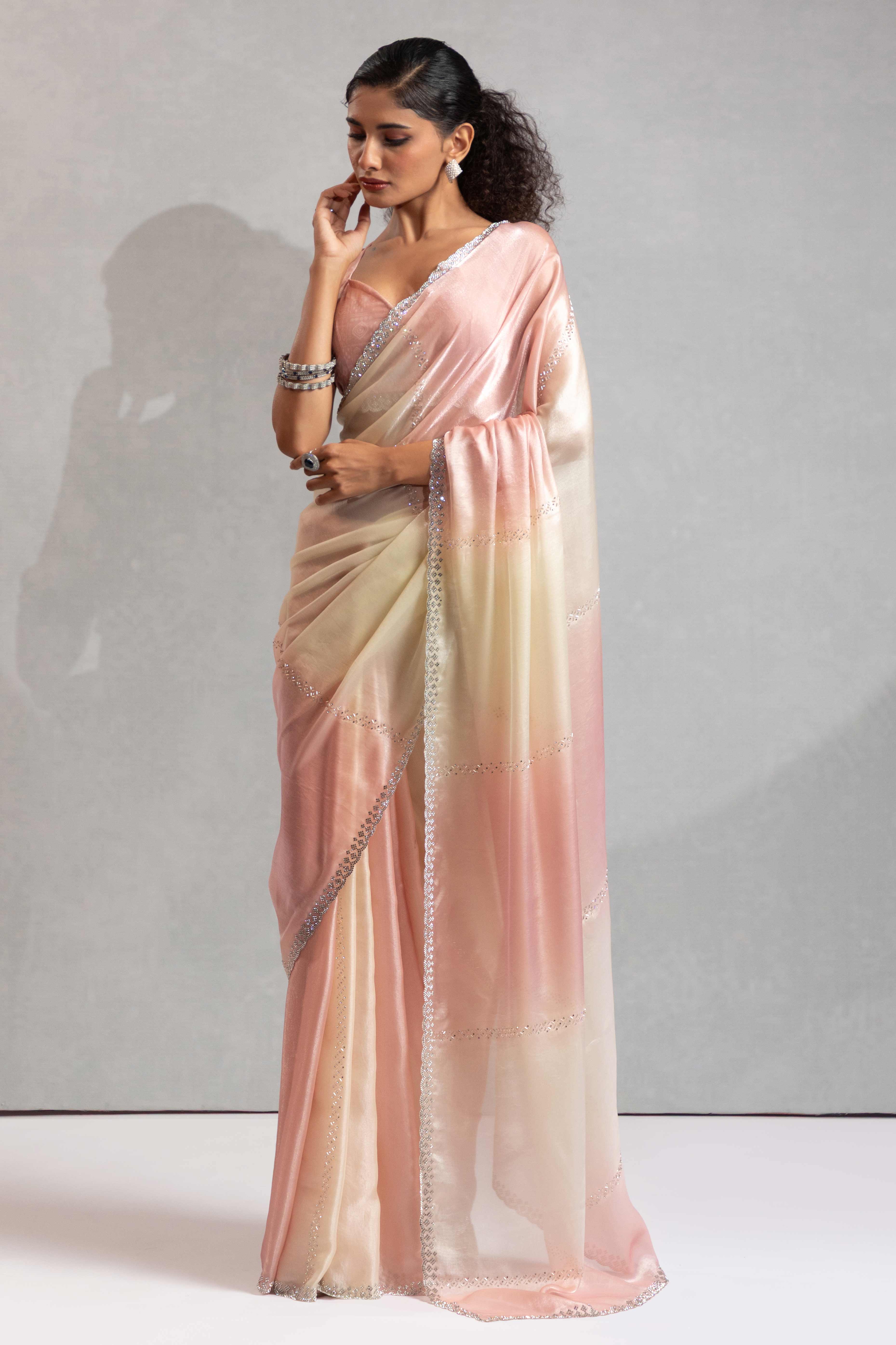 Light Coral & Off White Satin Silk Saree Decorated With Stone Embellishments