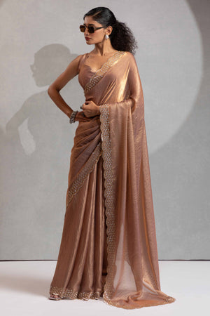 Shimmery Brown Satin Saree with Glamorous Stone Embellishment