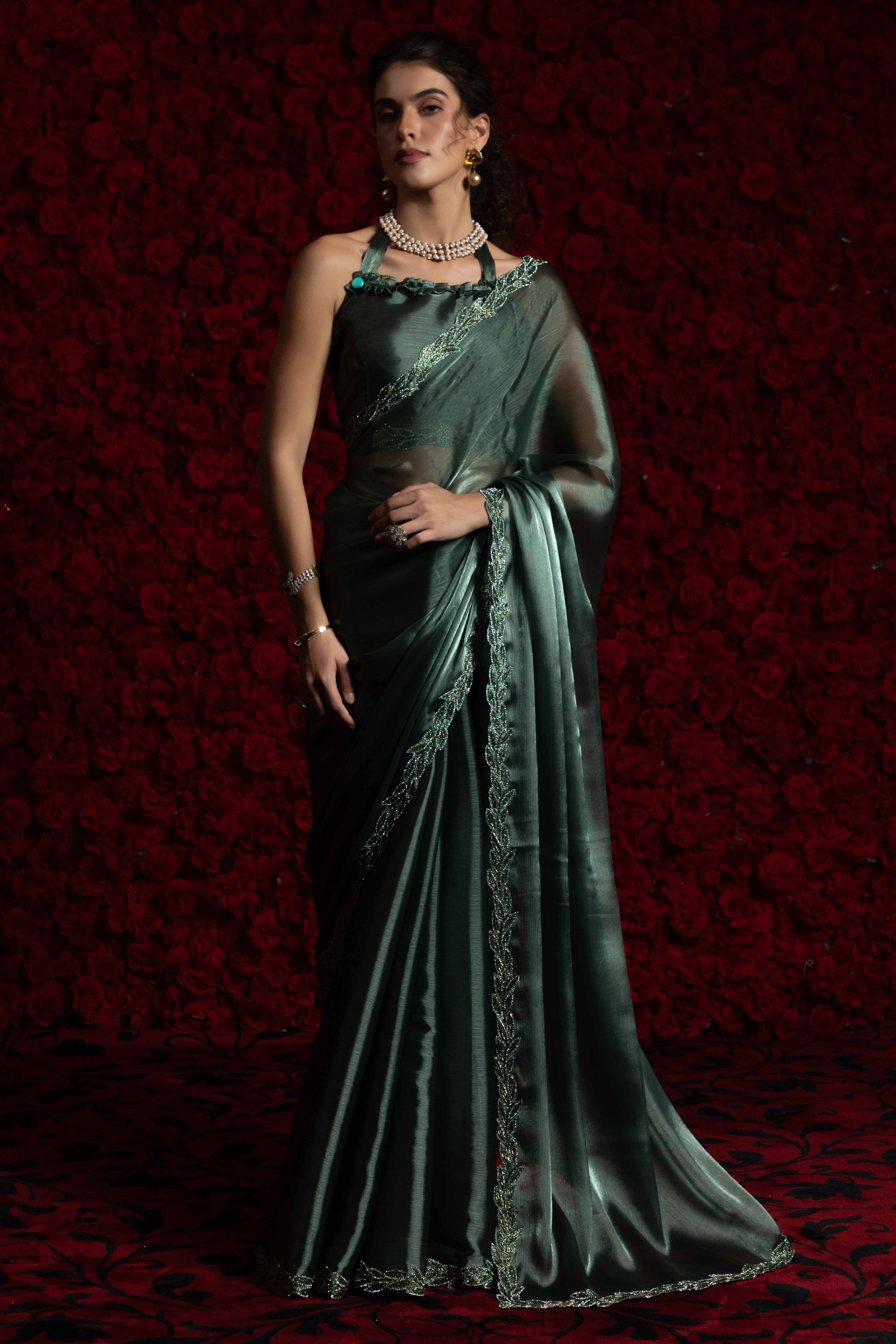 Emerald Green Solid Tissue Chiffon Saree Accented With Elegant Zarkan Work Border