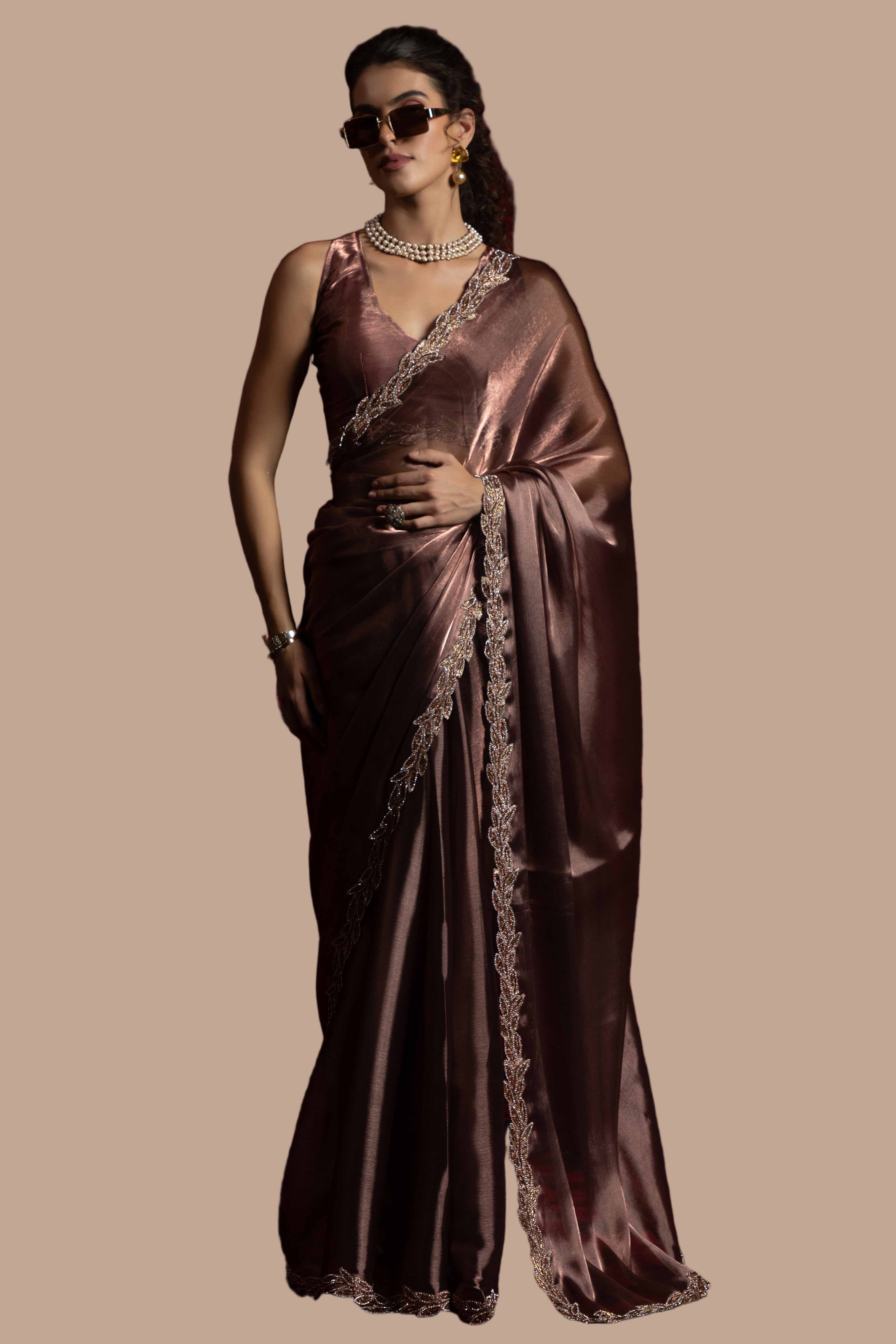 Dusty Rose Brown Solid Tissue Chiffon Saree Accented With Elegant Zarkan Work Border