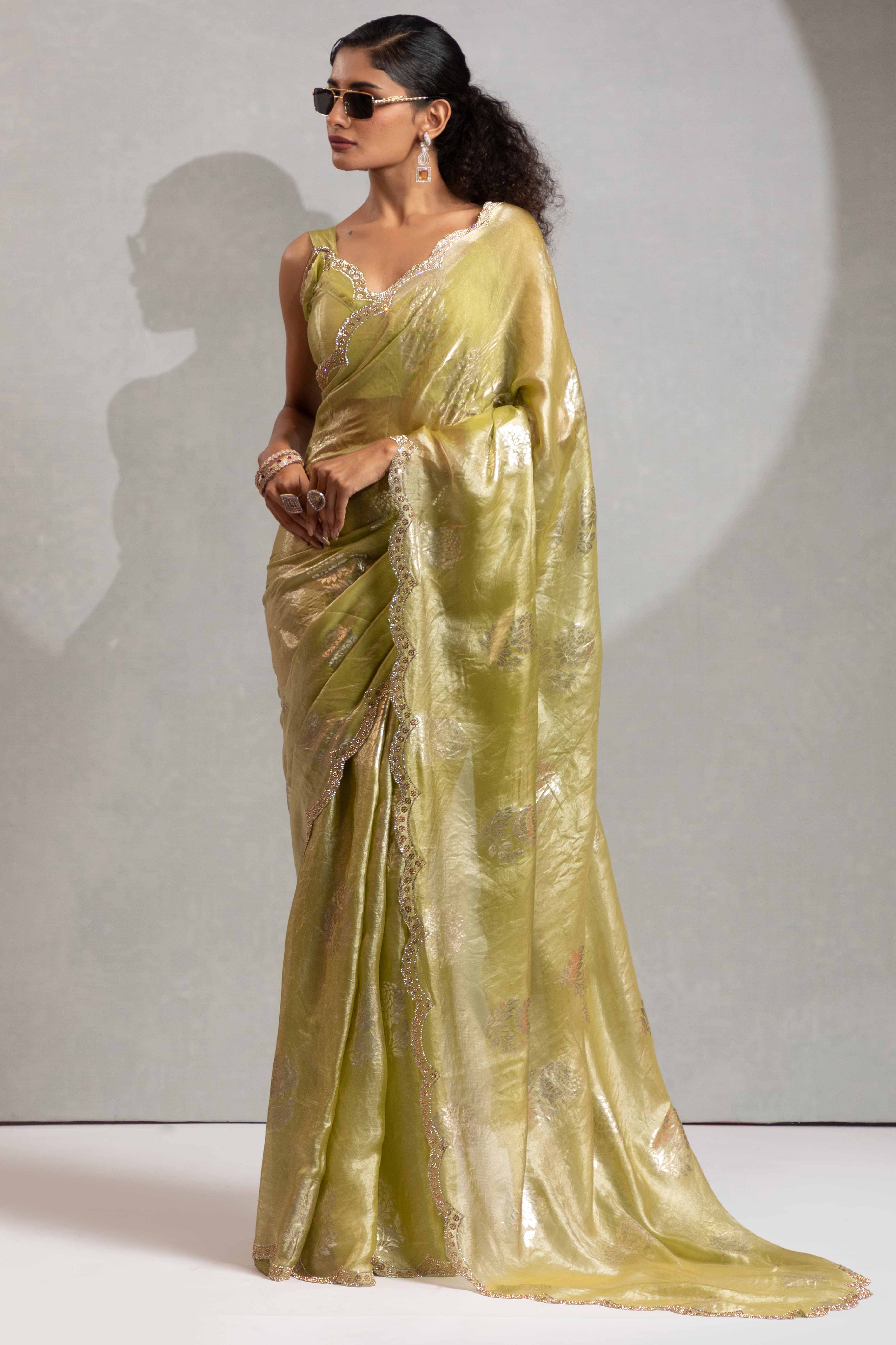 Green Satin Silk Saree Showcasing Elegant Floral Foil Prints & Dazzling Zarkan Work