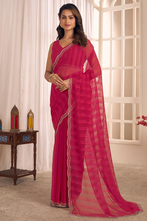 Pink Georgette Saree Featuring Contemporary Stripes With A Sparkling Diamond & Beads Work Border