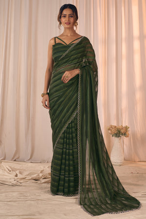 Dark Olive Striped Designer Georgette Saree Adorned With An Elegant Zarkan Cutwork Border
