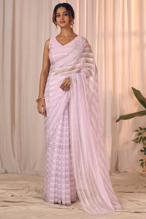 Light Lavender Striped Georgette Saree With Sparkling Zarkan Work & An Elegant Cutwork Border