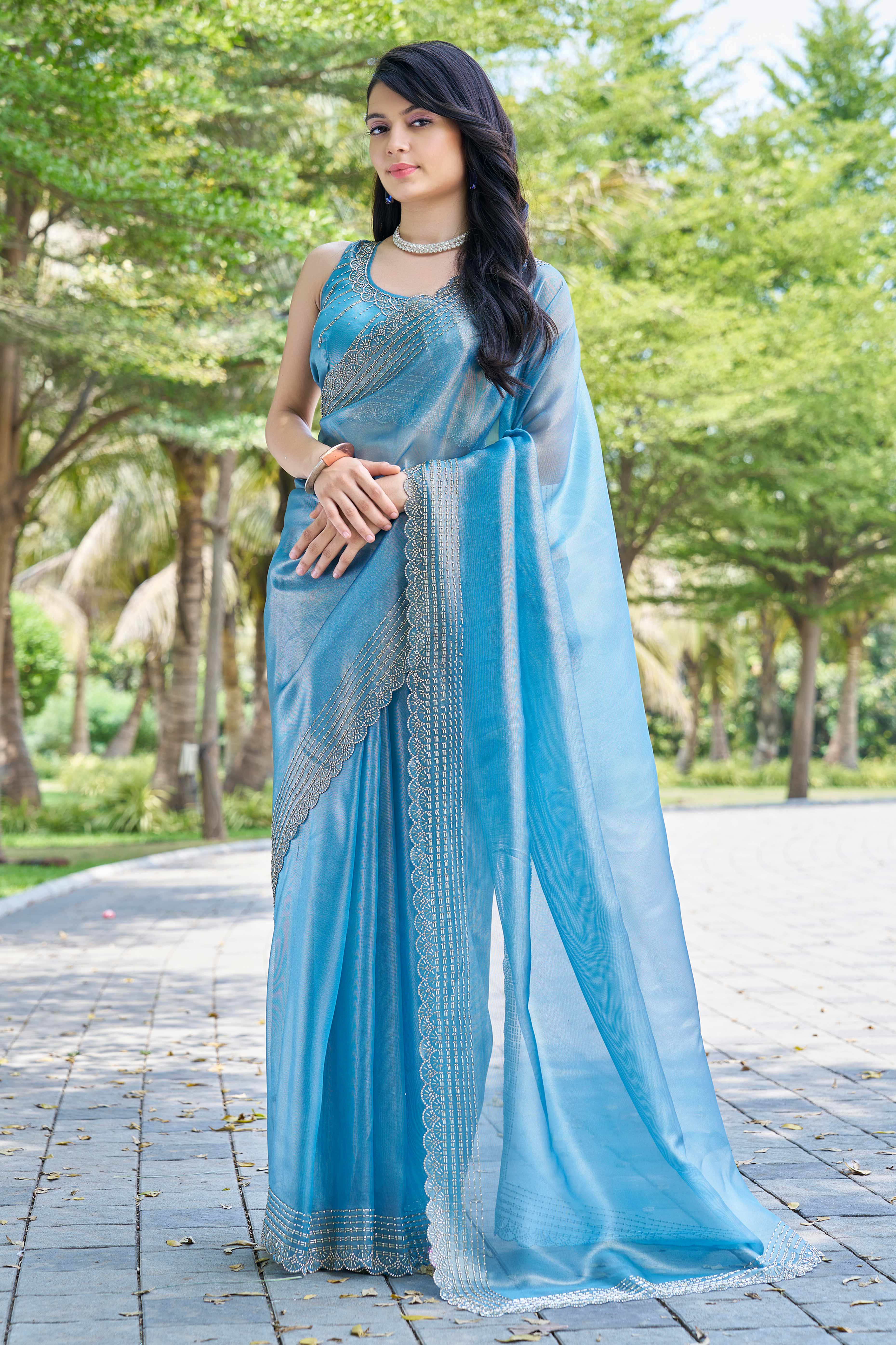 Teal Soft Organza Saree with Stone Embellishments Work