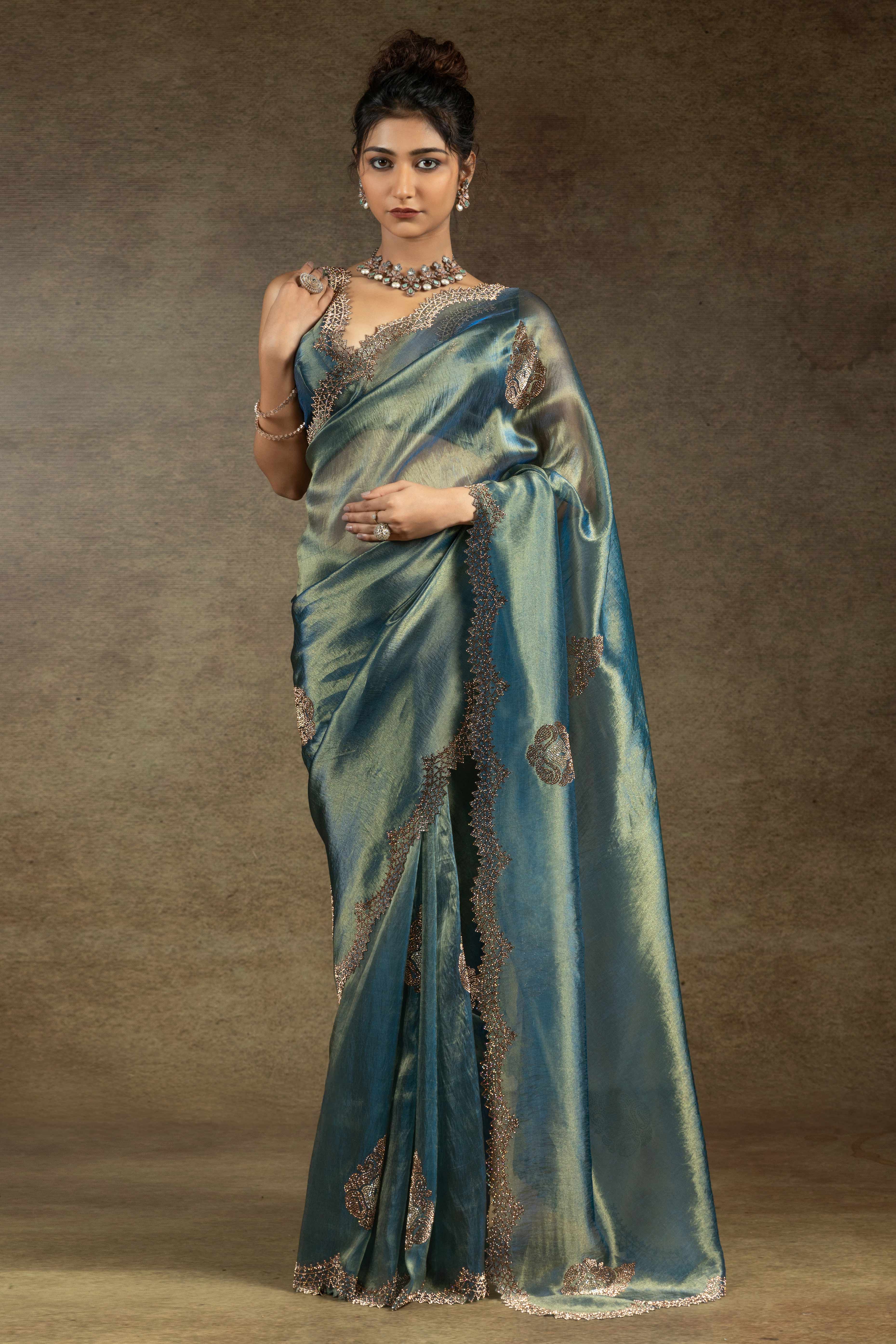 Teal Banarasi Silk Saree with Stone Embellishments Perfect for Party Wear