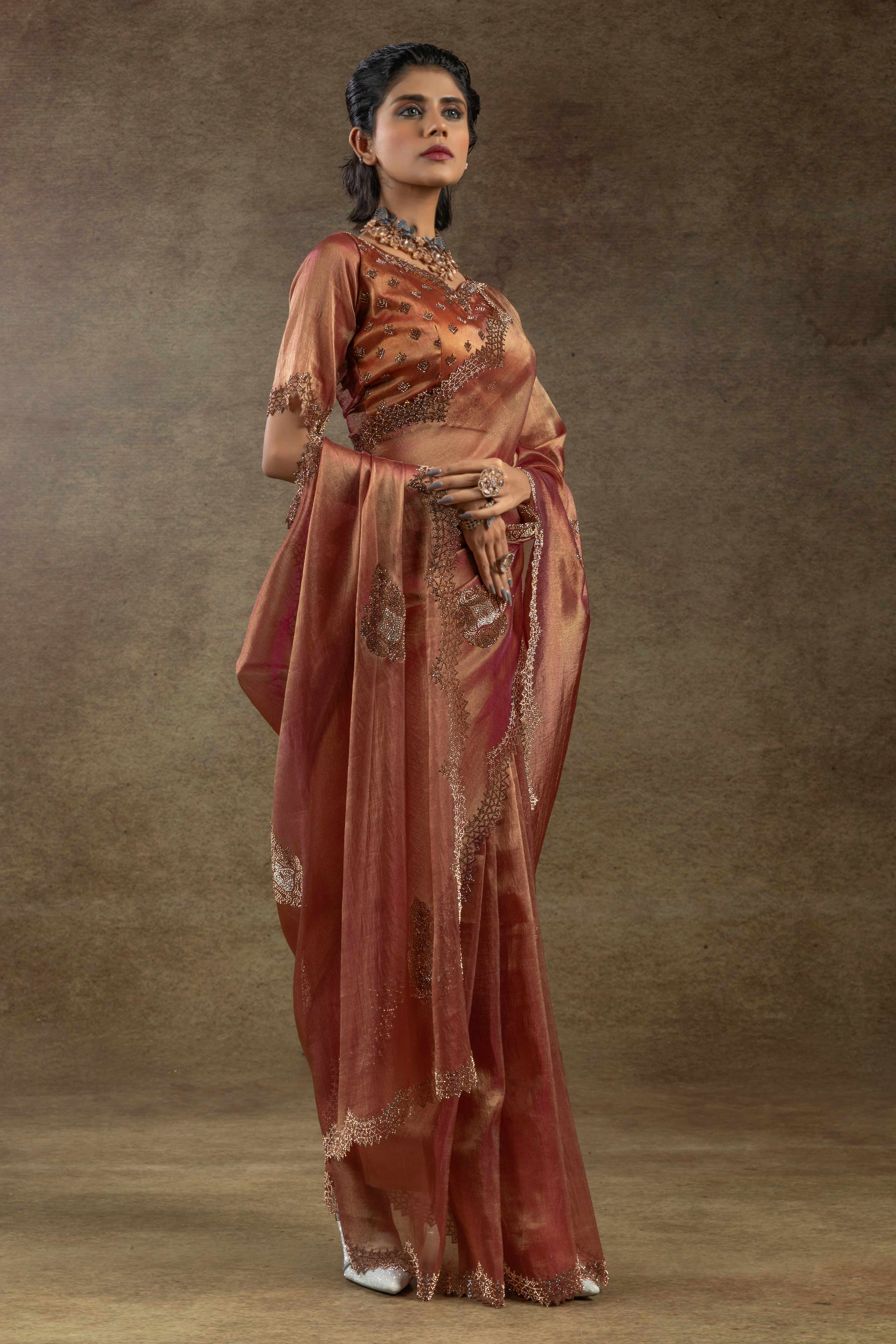 Peach Banarasi Silk Saree with Stone Embellishments Perfect for Party Wear