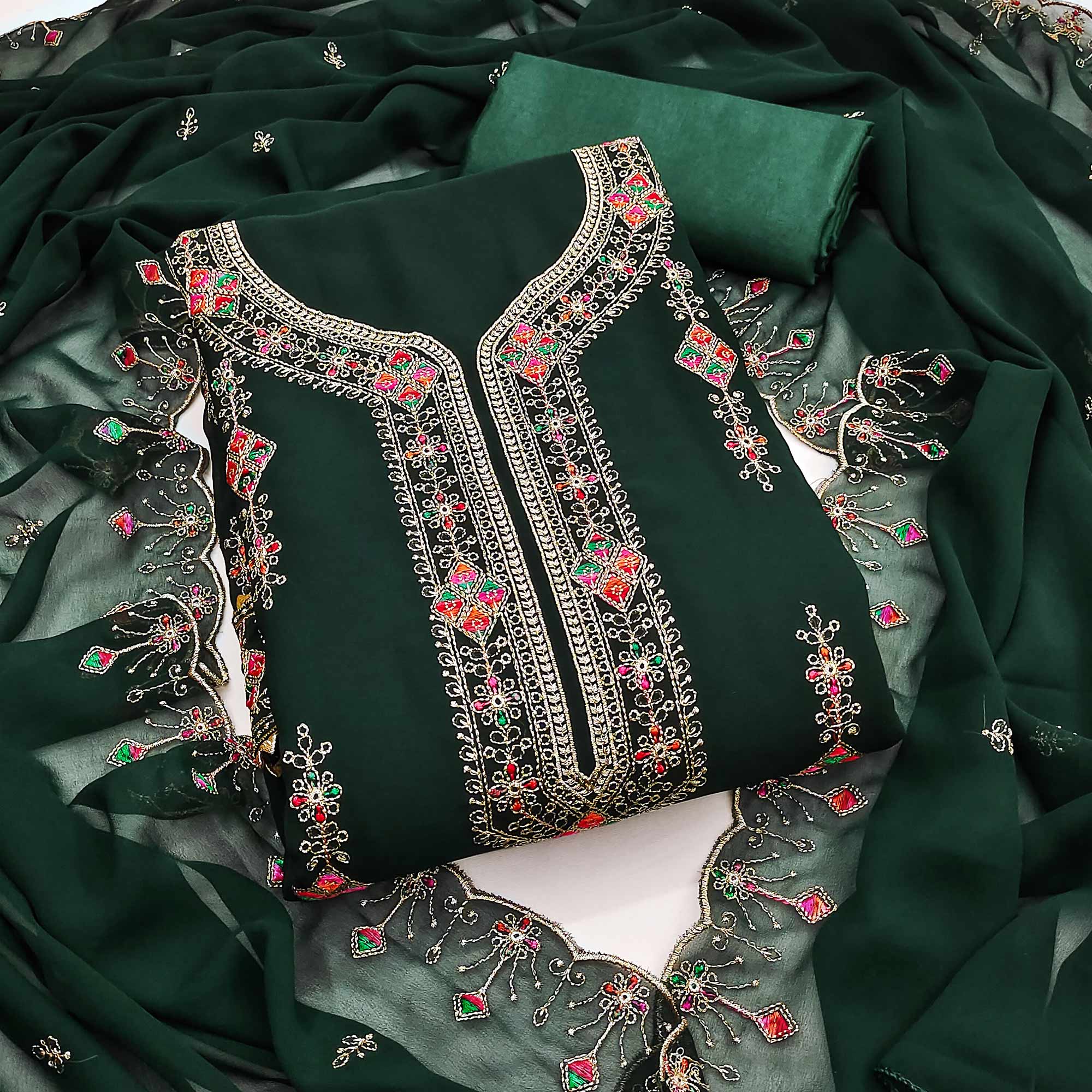 Green Georgette Dress Material Enhanced With Graceful Floral Embroidery For An Elegant Ethnic Look