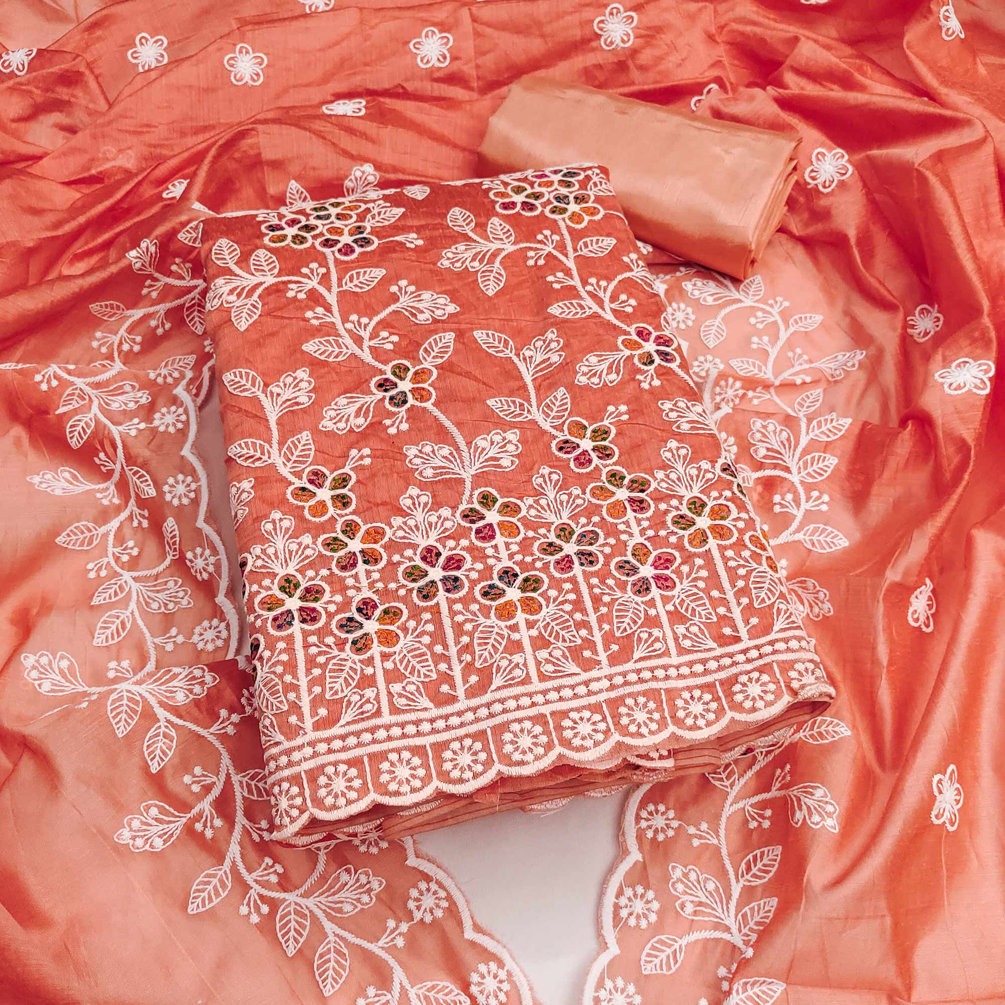 Orange Chanderi Cotton Dress Material Adorned With Elegant Floral Thread Embroidery Work