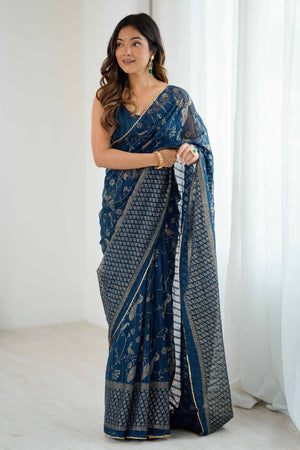 Morpich Blue Georgette Saree with Shimmering Foil Print & Gota Patti Border