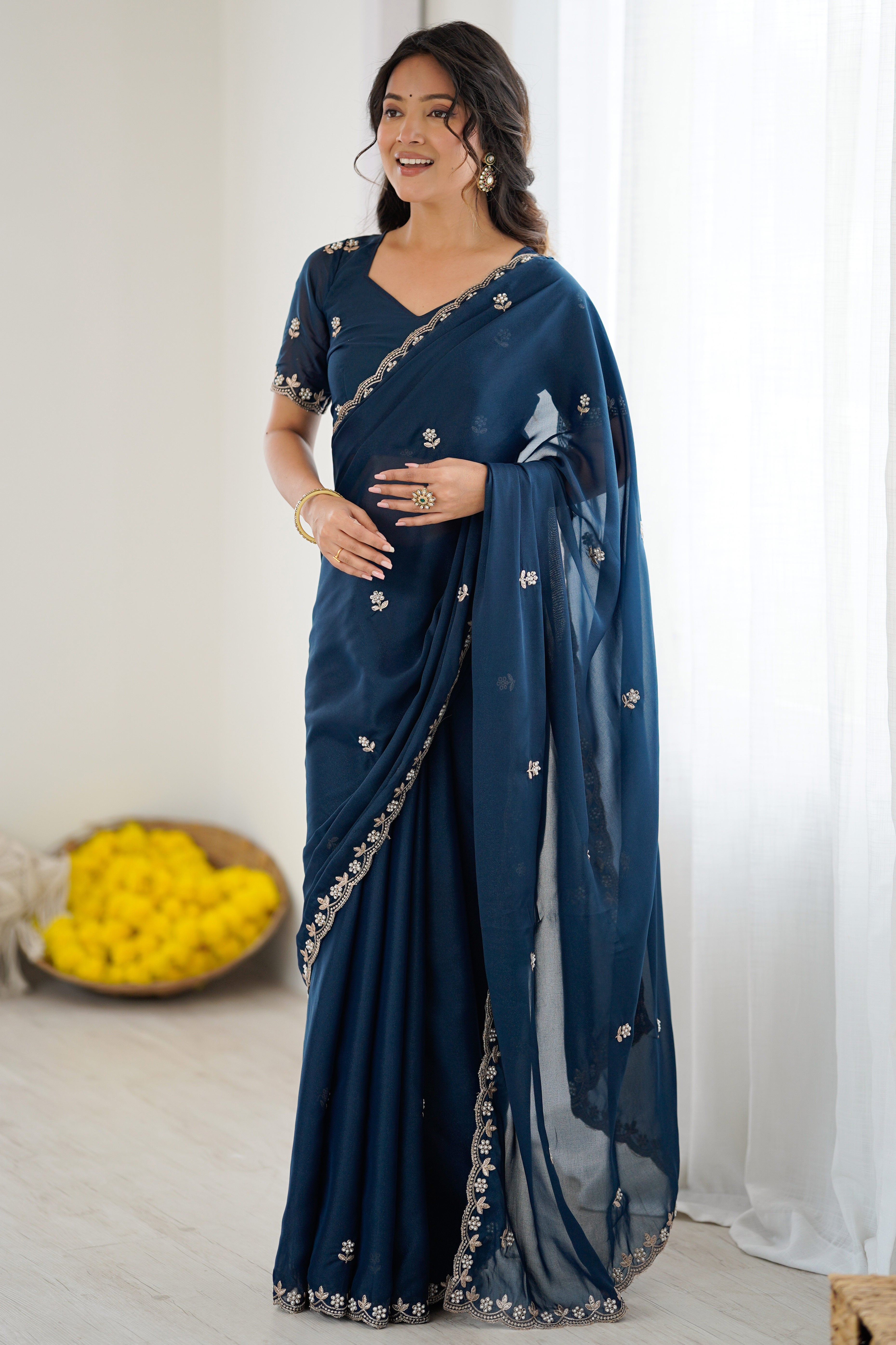 Blue Partywear Star Georgette Saree Adorned with Floral Embroidery and Beads Work