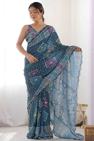 Morpich Blue Bandhani Digital Print Georgette Saree Enhanced With A Sparkling Lace Border