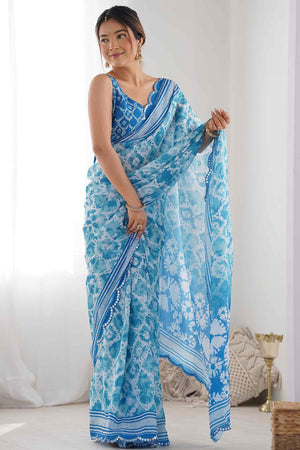 Sky Blue Digital Print Georgette Saree Enhanced With A Sparkling Lace Border