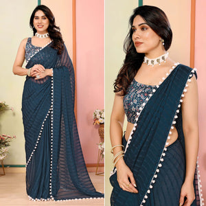 Teal Woven Striped Pattern Georgette Saree